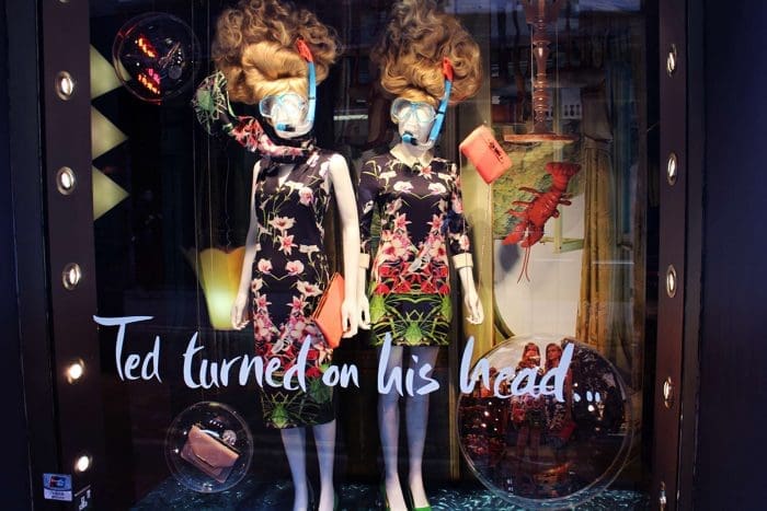 Ted Baker shop window with mannequins in diving masks and the slogan "Ted turned on his head"